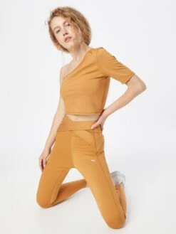 Puma T-Shirts T-shirt Fonctionnel Femme Cognac 9 Puma T-Shirts T-shirt Fonctionnel Femme Cognac -ADIDAS PERFORMANCE Soldes 68c6ee397c1c39677f170d8143836ee1