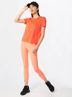 Nike Hauts Pratiques Fonctionnels T-shirt Fonctionnel Miler Femme Orange Fluo -ADIDAS PERFORMANCE Soldes 84decf5554251652b5507b47b0a35134