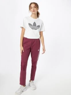 Adidas Sportswear Pantalons Dentraînement Effilé Pantalon De Sport Femme Lie De Vin -ADIDAS PERFORMANCE Soldes ea9794010a3dac68b315636c6893dbb2